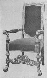 Reproduction of chair showing the transition between the time of Charles II and William and Mary. The carved strut remains but the back is lower and simpler.