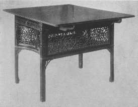 One of the most beautiful examples of Chippendale's fretwork tea-tables in existence.