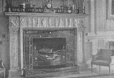 A mantel of marble and steel in the drawing-room, Rushton Hall, Northamptonshire—the work of the brothers Adam.