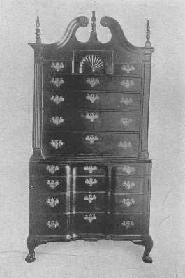 A very rare block-front chest of drawers with the original brasses.