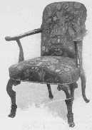 An elaborately carved Chippendale chair, with late Queen Anne influence in the shape of the back. Petit point covering which was so popular in her day is now wonderfully reproduced.