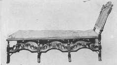 The first day beds, or chaise longue, were made during the Jacobean period. As will be seen, this "stretcher," as they were also called, has Charles II influence in its carving and Spanish feet.