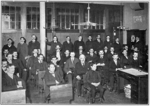 IN AN EVENING SCHOOL. NEW YORK.  American, Armenian, Austrian, Bohemian, Cuban, Dane, Dutch, Finlander, French, German, Greek, Hungarian, Irish, Italian, Japanese, Mexican, Negro, Norwegian, Pole, Roumanian, Russian, Scotch, Slovak, Spanish, Swede, Swiss. Can you tell them apart?