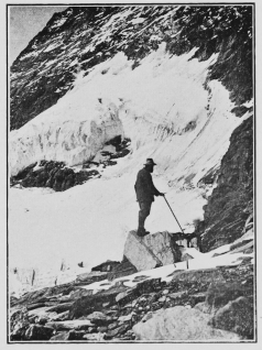 The Bergschrund, open when the accident to Mr. Sloggett’s party took place, was above the ice cliff below which the man is standing.  To face p. 8.