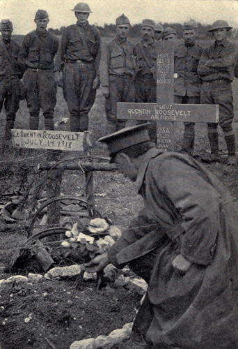 Colonel Barker placing the commander’s flowers on Lieutenant Quentin Roosevelt’s grave