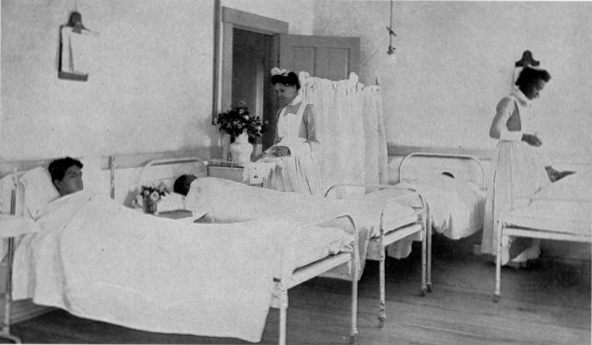 AT THE HOSPITAL.

A corner in the boys' ward.