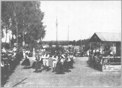 
FOLK DANCING AT THE MIDSUMMER NIGHT FESTIVAL IN DALECARLIA