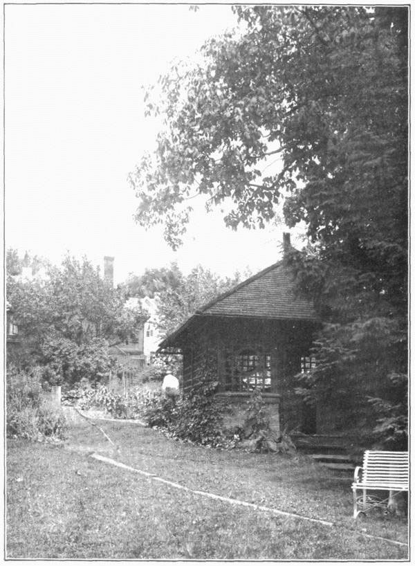 XI. The back yard, with
summer house, and gardens beyond.