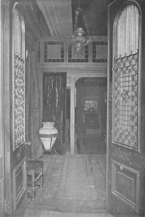 HALL IN CITY HOUSE SHOWING EFFECT OF STAIRCASE DIVIDED AND TURNED TO REAR