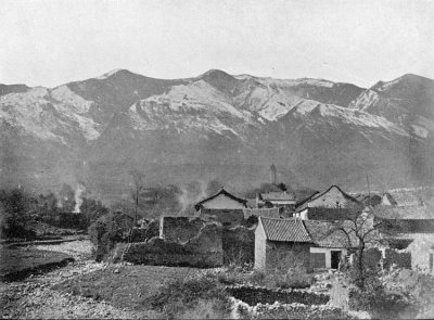 SNOW-CLAD MOUNTAINS BEHIND TALIFU.