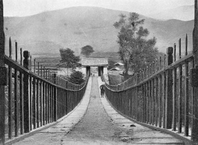 INSIDE VIEW OF A SUSPENSION BRIDGE IN FAR WESTERN CHINA.