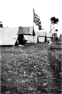 [Photograph: A Flag Flew Over the Colonel's Tent]