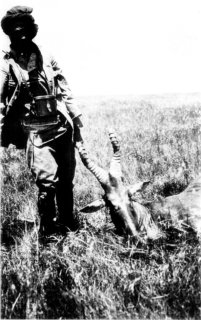 [Photograph: Hassan and a Hartebeest]