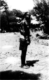 [Photograph: A Kikuyu Woman Uses Her Head]