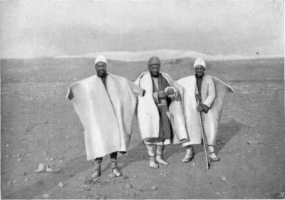 Author's Camel Men in their White Felt Coats.