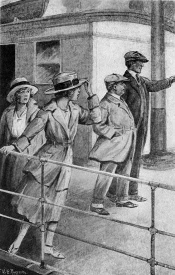 Nan's eyes were following the figures of two men strolling down the deck. (See page 140)