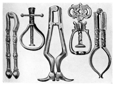 FIGS. 35-39.—EARLY STEEL AND BRASS NUTCRACKERS.  (In the collection of Mr. Charles Evans, of Nailsea Court.)