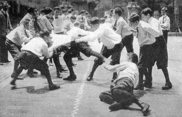 plate: Students playing CATCH-AND-PULL TUG OF WAR