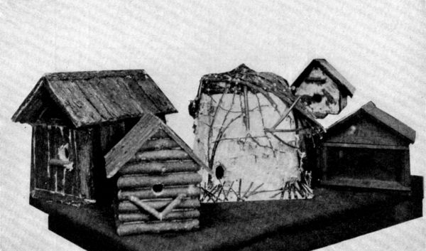 FIG. 28. RUSTIC HOUSES MADE BY ST. PAUL, MINN. BOYS.