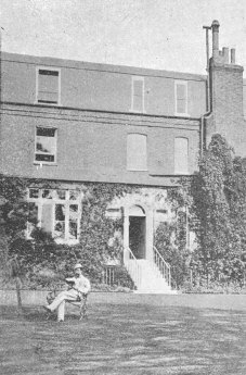 Charles Dickens Reading in Garden