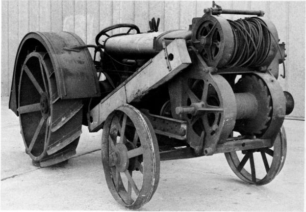 Figure 28.--Fordson tractor (1918) before restoration work. The winch and wheel fenders were added by the tractor's owners. (Catalog No. 350.)