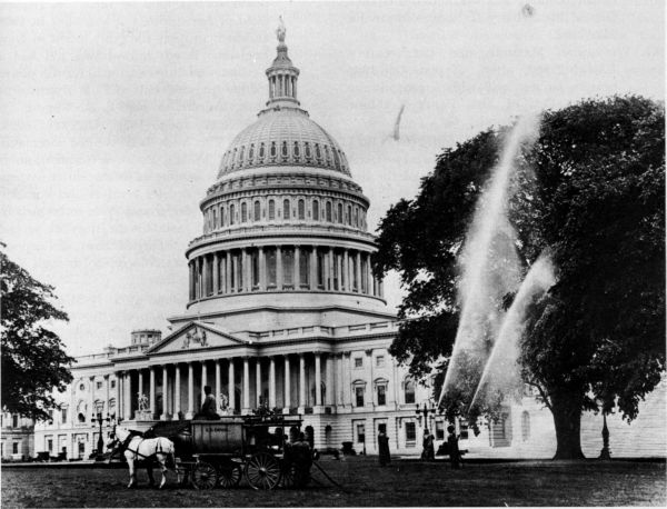 Figure 31.--Fitzhenry-Guptill power sprayer (1908), seen here spraying for elm leaf beetles on the grounds of the U.S. Capitol, May 1911. (Catalog No. 366.)