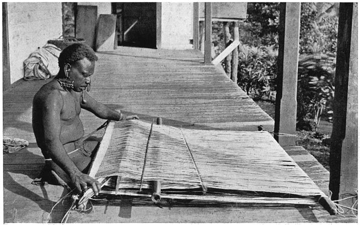 MAN FROM NITENDI WORKING THE LOOM.