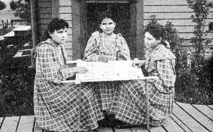 JUNIOR ENDEAVORERS MAKING A MISSIONARY QUILT.