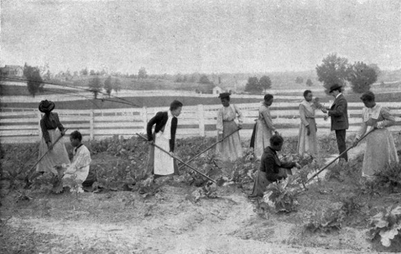 GIRLS GARDENING.