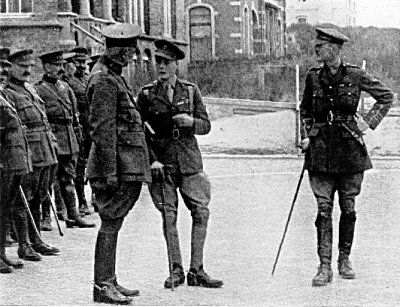 THE PRINCE OF WALES SPEAKING WITH BELGIAN OFFICERS AT LA PANNE, BELGIUM