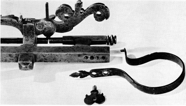 Figure 6.—Work spindle and its nut removed from the machine to illustrate how easily another spindle and nut of different pitch could be substituted. (Smithsonian photo 46525C.)