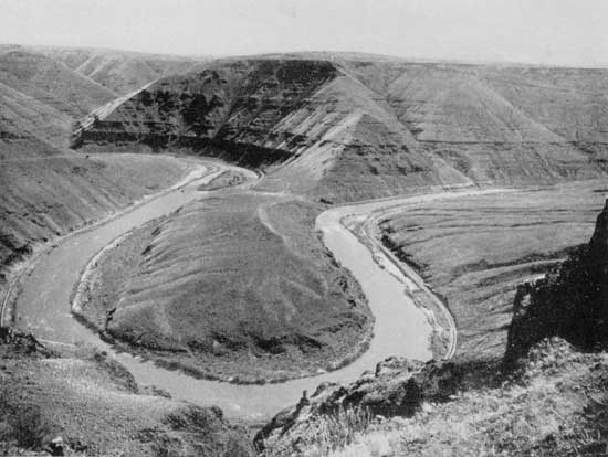 In the Deschutes Canyon. "The river winds sinuously, seeking first one, and then another, point of the compass" 