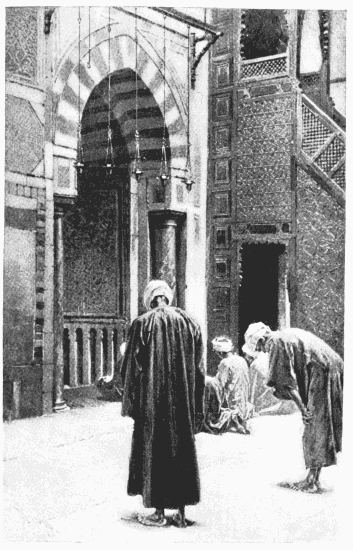 BEFORE THE SACRED NICHE From a photograph by Sebah, Cairo