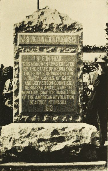 Oregon Trail Monument, located at the point where the line between Jefferson and Gage Counties intersects the Kansas-Nebraska State Line  Dedicated May 12, 1914. Cost $350. Trail crosses state line 1,986 feet east, and crosses Jefferson-Gage county line 2,286 feet north of this point. Erected by the citizens of Gage and Jefferson counties, Nebraska, Washington county, Kansas, and Elizabeth Montague Chapter, Daughters of the American Revolution