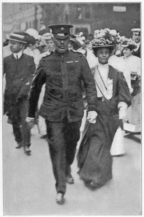 INSPECTOR WELLS CONDUCTING MRS. PANKHURST TO THE HOUSE OF COMMONS June, 1908