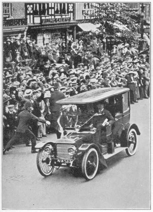 A SUFFRAGETTE THROWING A BAG OF FLOUR AT MR. ASQUITH IN CHESTER