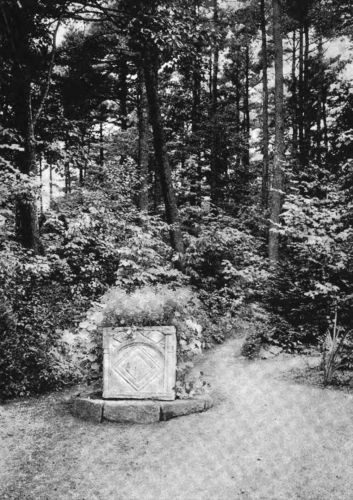 AN ORNAMENT DELIGHTFULLY USED TO MARK THE OPENING OF PATHS THROUGH WOODS