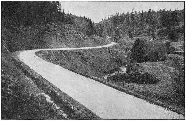 THE PACIFIC HIGHWAY IN PASS CREEK CANYON, DOUGLAS COUNTY. GRADED AND MACADAMIZED IN 1917 AND 1918