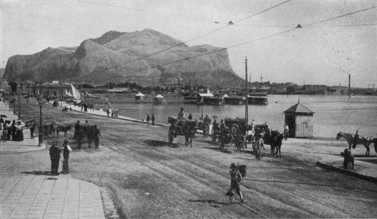 Monte Pellegrino looms square and massive at one tip of Palermo’s crescent harbor.