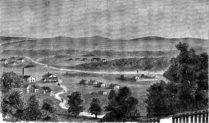 White clapboard buildings of various sizes and a stockaded fort.