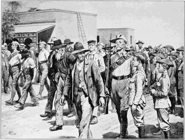 THE LAST ATTACK ON MAFEKING: B.S.A. POLICE ESCORTING BOER PRISONERS TO THE GAOL