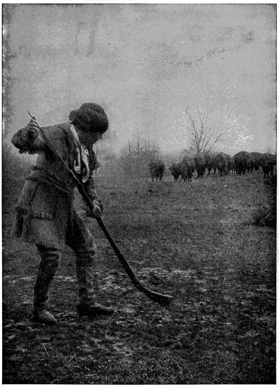 Muzzle-loading a flint-lock rifle