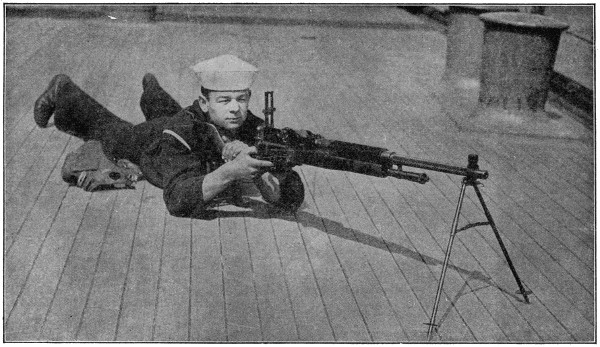 Mariner behind machine gun