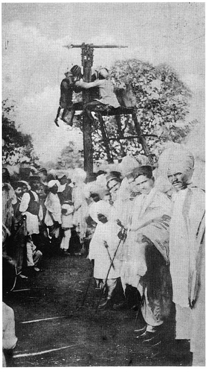 Woman about to be swung round the post called Meghnāth