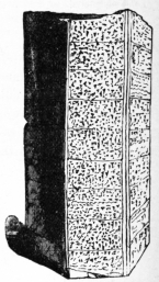 Fig. 46.—Assyrian Cylinder, inscribed with the Records of a King’s Reign. (British Museum.)