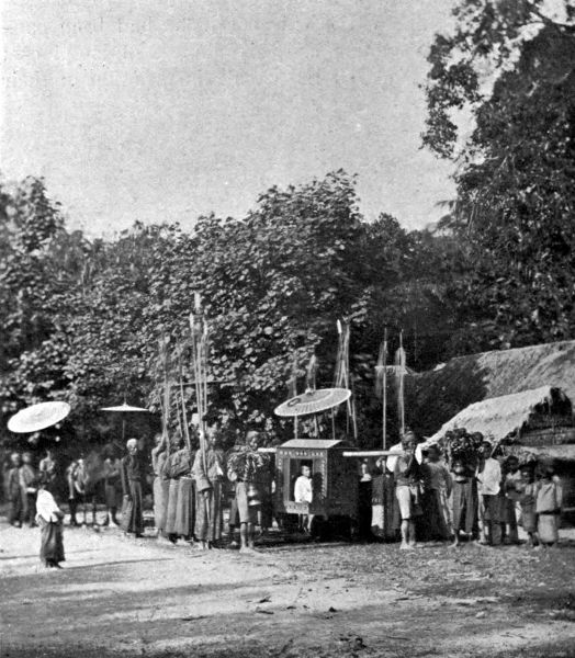 The wedding-guests on their procession through the village.