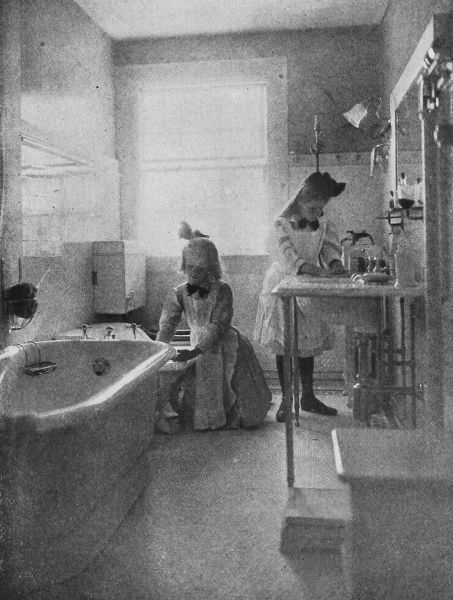 two girls in laundry room