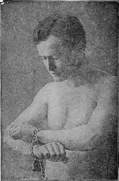 Houdini, as Chained and Handcuffed Before the Judges in the First Trial of His Action Against the Royal Police of Cologne.