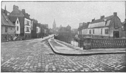 PONT DE LA DODANE.  On right of Canal, RUE D’ENGOULVENT. On the left, RUE DES MAJOTS. In the background, ST. LEU CHURCH.