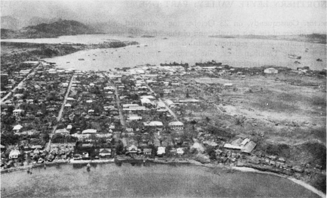 TACLOBAN from the air (above). Close-up of the dock area (below), showing San Juanico Strait and the island of Samar in the background.